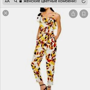 Jennifer Lopez Floral Asymmetrical Strap Jumpsuit